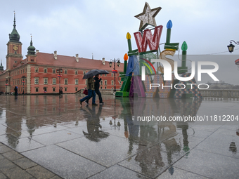 WARSAW, POLAND - NOVEMBER 19:   
Christmas tree and decorations being set up in front of the Royal Castle in Warsaw, preparing for the holid...