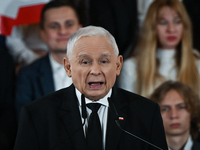 KRAKOW, POLAND - NOVEMBER 24:
Jaroslaw Kaczynski (Center), leader of the opposition Law and Justice party, addresses the crowd during the no...