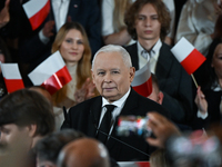 KRAKOW, POLAND - NOVEMBER 24:
Jaroslaw Kaczynski (Center), leader of the opposition Law and Justice party, addresses the crowd during the no...