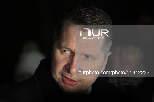 KRAKOW, POLAND - NOVEMBER 24:
Przemyslaw Czarnek, Law and Justice party MP, speaks to the media as he leaves the venue where Karol Nawrocki...