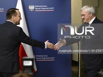 Ukrainian FM Andrii Sybiha meets with his counterpart Radoslaw Sikorski at the Ministry of Foreign Affairs in Warsaw, Poland on 26 November,...