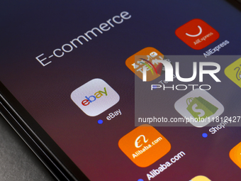 The e-commerce services eBay, Temu, AliExpress, Alibaba, Shopify, and Mercado Libre app appear on the screen of a smartphone in Reno, United...