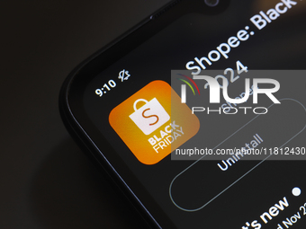 The Shopee app logo appears on the screen of a smartphone in Reno, United States, on November 26, 2024. (