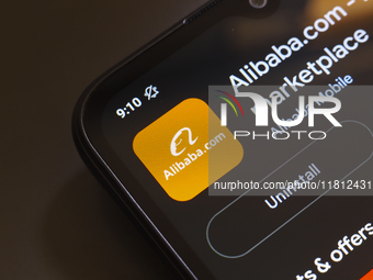 The Alibaba Group app logo appears on the screen of a smartphone in Reno, United States, on November 26, 2024. (