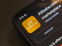 The Alibaba Group app logo appears on the screen of a smartphone in Reno, United States, on November 26, 2024. (