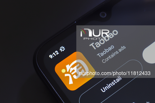 The Taobao app logo appears on the screen of a smartphone in Reno, United States, on November 26, 2024. 