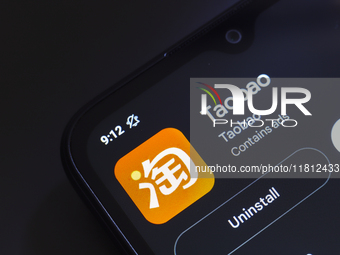 The Taobao app logo appears on the screen of a smartphone in Reno, United States, on November 26, 2024. (