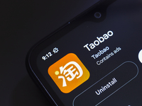 The Taobao app logo appears on the screen of a smartphone in Reno, United States, on November 26, 2024. (