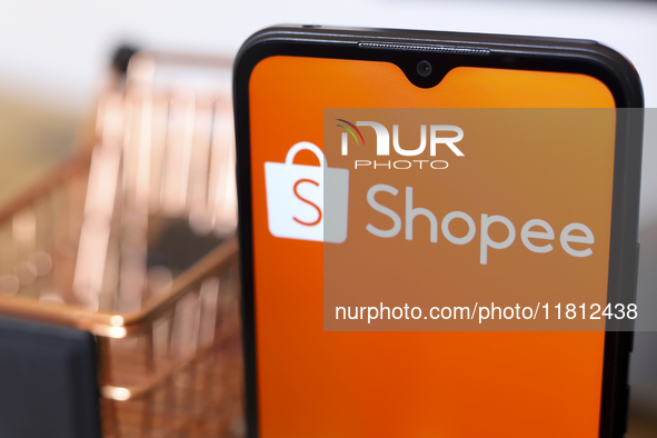 The Shopee logo appears on the screen of a smartphone in Reno, United States, on November 26, 2024. 