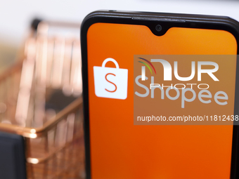 The Shopee logo appears on the screen of a smartphone in Reno, United States, on November 26, 2024. (