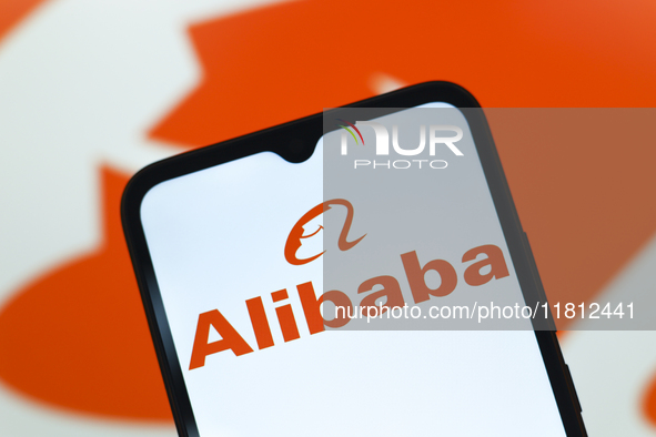 The Alibaba logo appears on the screen of a smartphone in Reno, United States, on November 26, 2024. 