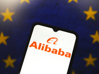 The Alibaba logo appears on the screen of a smartphone, and in the background, the flag of the European Union (EU) is visible in Reno, Unite...