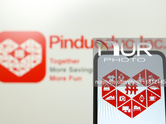 The Pinduoduo logo appears on the screen of a smartphone and in the background on a computer screen in Reno, United States, on November 26,...