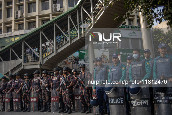 Border Guard Bangladesh (BGB) and police personnel stand guard to ensure law and order in Shahbagh, Dhaka, Bangladesh, on November 26, 2024....