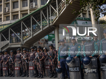 Border Guard Bangladesh (BGB) and police personnel stand guard to ensure law and order in Shahbagh, Dhaka, Bangladesh, on November 26, 2024....