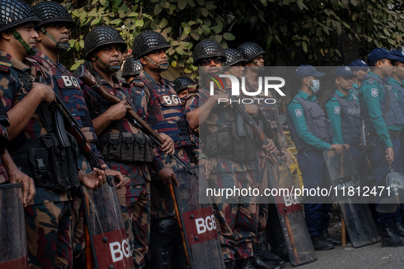 Border Guard Bangladesh (BGB) and police personnel stand guard to ensure law and order in Shahbagh, Dhaka, Bangladesh, on November 26, 2024....