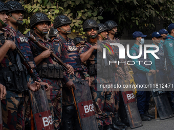 Border Guard Bangladesh (BGB) and police personnel stand guard to ensure law and order in Shahbagh, Dhaka, Bangladesh, on November 26, 2024....