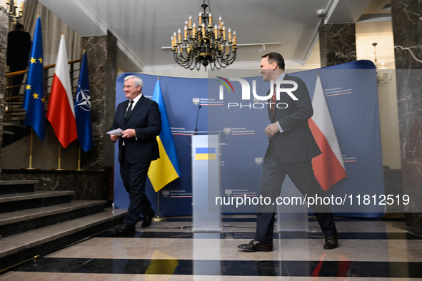 Ukrainian FM Andrii Sybiha (l) meets with his counterpart Radoslaw Sikorski (r) at the Ministry of Foreign Affairs in Warsaw, Poland on 26 N...