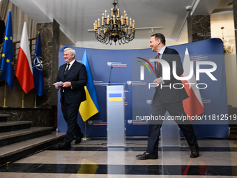 Ukrainian FM Andrii Sybiha (l) meets with his counterpart Radoslaw Sikorski (r) at the Ministry of Foreign Affairs in Warsaw, Poland on 26 N...