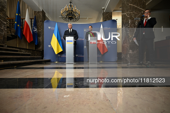 Ukrainian FM Andrii Sybiha (l) meets with his counterpart Radoslaw Sikorski (r) at the Ministry of Foreign Affairs in Warsaw, Poland on 26 N...