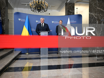 Ukrainian FM Andrii Sybiha (l) meets with his counterpart Radoslaw Sikorski (r) at the Ministry of Foreign Affairs in Warsaw, Poland on 26 N...