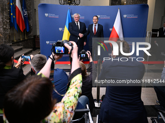 Ukrainian FM Andrii Sybiha (l) meets with his counterpart Radoslaw Sikorski (r) at the Ministry of Foreign Affairs in Warsaw, Poland on 26 N...