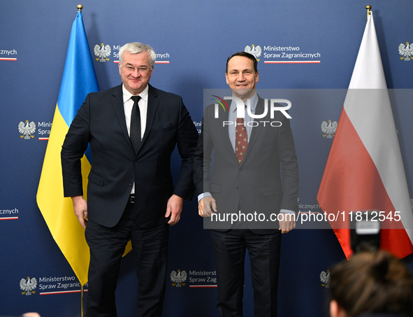 Ukrainian FM Andrii Sybiha (l) meets with his counterpart Radoslaw Sikorski (r) at the Ministry of Foreign Affairs in Warsaw, Poland on 26 N...