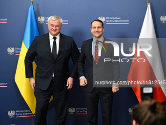 Ukrainian FM Andrii Sybiha (l) meets with his counterpart Radoslaw Sikorski (r) at the Ministry of Foreign Affairs in Warsaw, Poland on 26 N...