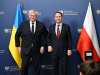 Ukrainian FM Andrii Sybiha (l) meets with his counterpart Radoslaw Sikorski (r) at the Ministry of Foreign Affairs in Warsaw, Poland on 26 N...