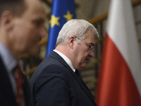 Ukraine's Foreign Affairs Minister Andrii Sybiha (center) and Poland's Minister of Foreign Affairs Radoslaw Sikorski (left) arrive at a pres...