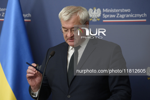 Ukraine's Foreign Affairs Minister Andrii Sybiha gestures as he participates in a press conference after talks with his Polish counterpart R...