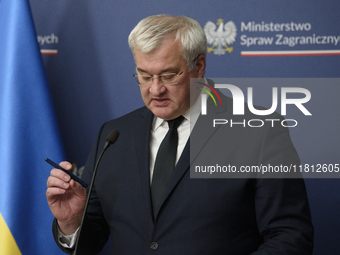 Ukraine's Foreign Affairs Minister Andrii Sybiha gestures as he participates in a press conference after talks with his Polish counterpart R...