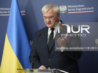 Ukraine's Foreign Affairs Minister Andrii Sybiha gestures as he participates in a press conference after talks with his Polish counterpart R...