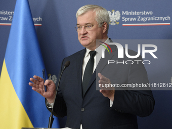 Ukraine's Foreign Affairs Minister Andrii Sybiha gestures as he participates in a press conference after talks with his Polish counterpart R...