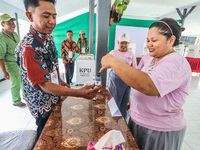 Inmates participate in the simultaneous regional election at a polling station in a prison in Semarang, Central Java Province, on November 2...