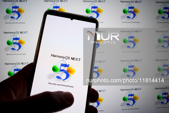 The logo of the Huawei HarmonyOS NEXT operating system appears on a smartphone screen and on a computer screen as a background in this photo...