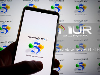 The logo of the Huawei HarmonyOS NEXT operating system appears on a smartphone screen and on a computer screen as a background in this photo...