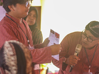 Election staffers count ballots at a polling station in Semarang, Central Java Province, on November 27, 2024, after Indonesians vote to pic...