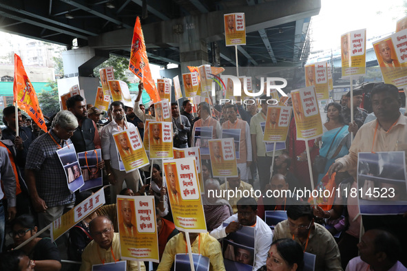 Bharatiya Janata Party (BJP) activists shout slogans and carry placards during a protest rally towards the Bangladesh High Commission after...