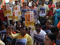 Bharatiya Janata Party (BJP) activists shout slogans and carry placards during a protest rally towards the Bangladesh High Commission after...