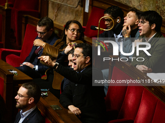 Gabriel Amard, deputy of the La France Insoumise - Nouveau Front Populaire group, protests during the speech of Bruno Retailleau, Minister o...