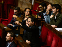 Gabriel Amard, deputy of the La France Insoumise - Nouveau Front Populaire group, protests during the speech of Bruno Retailleau, Minister o...