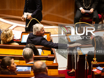 French Prime Minister Michel Barnier is seen during the questions to the government session at the National Assembly in Paris, France, on No...