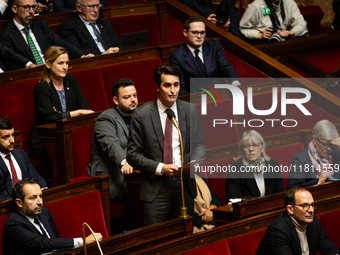 Gaetan Dussausaye, deputy of the Rassemblement National group, speaks during questions to the French government at the National Assembly in...