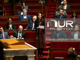 Elsa Faucillon, deputy of the Gauche Democrate et Republicaine group, speaks during questions to the French government at the National Assem...