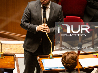 Antoine Armand, the French Minister of Economy, Finance, and Industry, speaks at the public session of questions to the French government at...