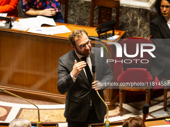 Antoine Armand, the French Minister of Economy, Finance, and Industry, speaks at the public session of questions to the French government at...