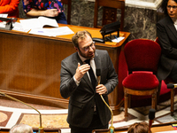 Antoine Armand, the French Minister of Economy, Finance, and Industry, speaks at the public session of questions to the French government at...