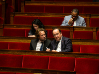 In Paris, France, on November 26, 2024, Boris Vallaud, President of the Socialistes et Apparentes group, and Francois Hollande, deputy of th...