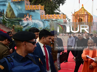 Chief Minister of India's Uttar Pradesh state, Yogi Adityanath, inspects the ongoing preparations ahead of the Maha Kumbh Mela festival alon...